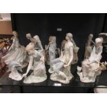 A collection of twelve Lladro figures (12) One dolphin missing a fin otherwise no obvious damage.