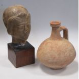 A 19th century marble head and an Egyptian terracotta ewer