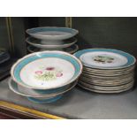 A late 19th century floral dessert service with turquoise rim bands