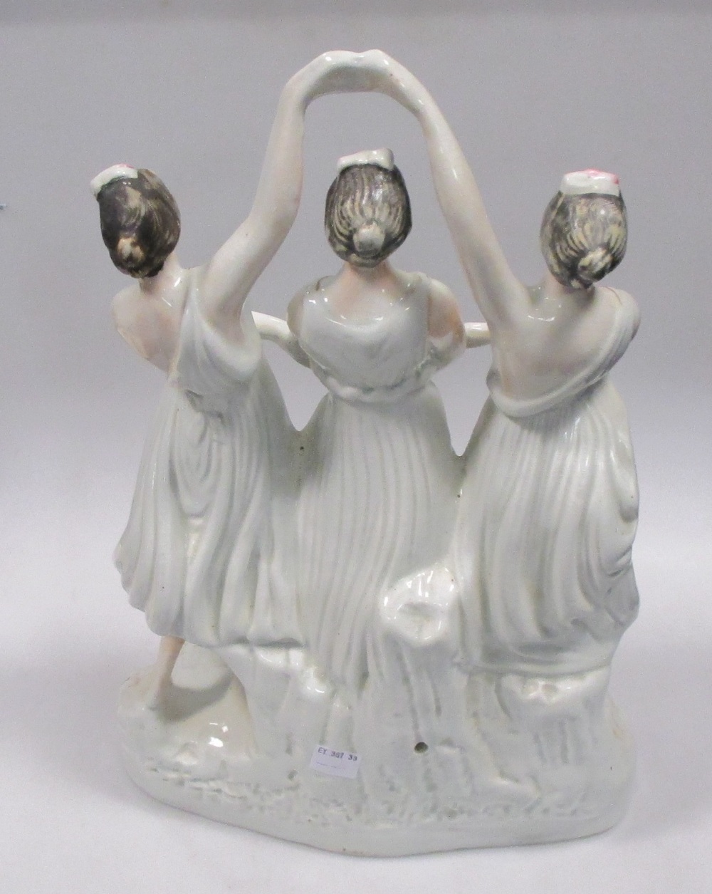 A 19th century Staffordshire group of three dancing ladies, 39cm high Hairline to the base but not - Image 2 of 3