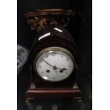 An Edwardian mahogany mantel clock with enamel dial and French gong striking movement together