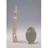 A celadon vase and a marine ivory carving