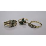An 18ct green and white hardstone ring, size M, a green hardstone ring stamped 585, size L-M and