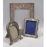 Three silver photograph frames Largest, 31 (h) x 21cm (w) large knock to the top, missing back and