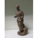 A 19th century French terracotta figure of a Chinese man, 33cm (13 in) high His right hand is