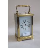 A 19th century French brass cased carriage clock, with repeat striking movement, 17cm high