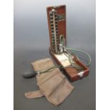 A Baumanometer 'Kit' Bag model in fitted walnut case with instructions