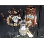 An 18th century ale tankard, a 19th century bargeware teapot and similar jug, both of Bottisham