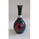 A Moorcroft green glazed 'Peony' pattern vase, 21cm high