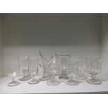 Nine rummer type glasses together with seven sugar crushers (16) One has a crack at the base of