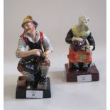 A pair of early 19th century Staffordshire square base figures, the cobbler and his wife, 15cm