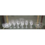 A set of six Game bird engraved wine glasses, four further engraved wine glasses, a water jug, a