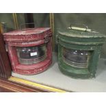 A pair of early 20th century ships lamps, zinc plated in green and red for port and starboard