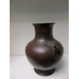 An 18th century taste bronze vase,