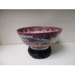 A late 18th/early 19th century mandarin palette bowl with a wood stand,