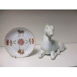A late 19th/early 20th century Hirado reclining horse and a Chinese dish,