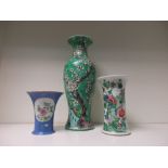 A 19th century famille verte vase, another with incised blue ground, a biscuit decorated vase,