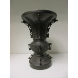 A late 19th/early 20th century bronze vase,