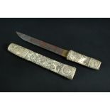 A late 19th/early 20th century dagger in carved ivory scabbard,