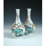 A pair of famille verte bottle vases, period of Kangxi,