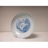 A blue and white plate,