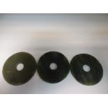 Three Chinese jade bi discs, 7.5cm (3 in) diameter (3)