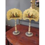 A pair of Regency papier mache fire quants