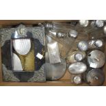 A collection of silver topped bottles, silver backed brushes etc.
