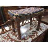 A small oak stool with needlework top, together with various needlework and embroidery hangings,