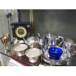 A quantity of assorted EPNS and white metal wares to include a three branch candleabra, tea set,