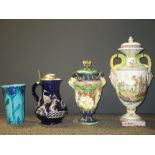 A collection of Continental ceramics, to include a French faience urn and cover marked A.