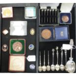 A silver cigarette case, together with silver spoons, badges and medals