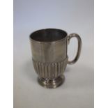 A silver christening mug