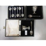 Two cased silver christening sets, together with a cased set of six silver teaspoons (3)