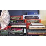 A group of OO gauge trains, carriages and tenders, mainly by Hornby