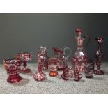 A group of ruby overlay and other glass