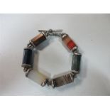A late Victorian Scottish agate bracelet, set with six different stones to include a banded agate, a