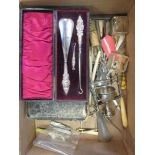 A quantity of silver to include a shoe horn and button hooks, cased, a part dressing set, cased, two