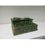 A green glazed pottery inkstand, possibly mid 19th century French, 18cm wide There are old chips