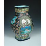 A late 19th/early 20th century Longwy vase, the rectangular sectioned baluster shape enamelled in