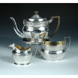 A George III four piece silver tea set by Alexander Field, London 1801, comprising:- an oval