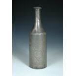 A pewter bottle with inscribed date April 2nd 1859, the neck flaring into broad shoulders above