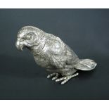 A continental metalwares caster modelled as a parrot, unmarked other than 800, standing wings