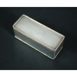 A large George IV silver snuffbox, maker W.?. London 1824, of rectangular shape, allover engine