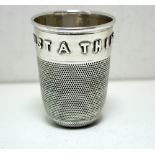 A Victorian silver spirit measure, by George Unite, Birmingham 1876, modelled as an outsized thimble