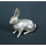An Edwardian silver pepper caster, probably by George Bedingham, London 1904, modelled as a hare