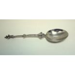 A Continental silver apostle spoon (St Andrew), with cast stem, the ovoid bowl with faux marks to