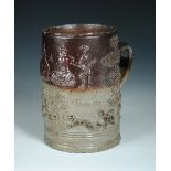 Attributed to Vauxhall, a brown salt glazed quart mug, inscribed 'Ambrose Thomson 1722' below a