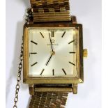 Omega - a 9ct gold cased gentleman's wristwatch, the square silvered dial with gold coloured baton