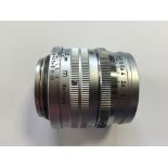 A 1956 Leica Summarit f=5 1:15 chrome lens, numbered 1390844, without dust covers